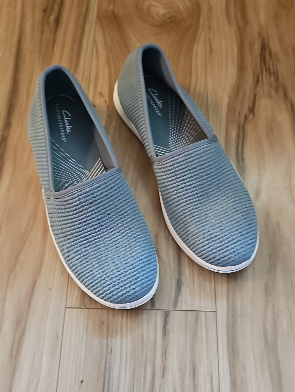 Cloudsteppers by Clarks Light Blue Knit Slip-On Flats
